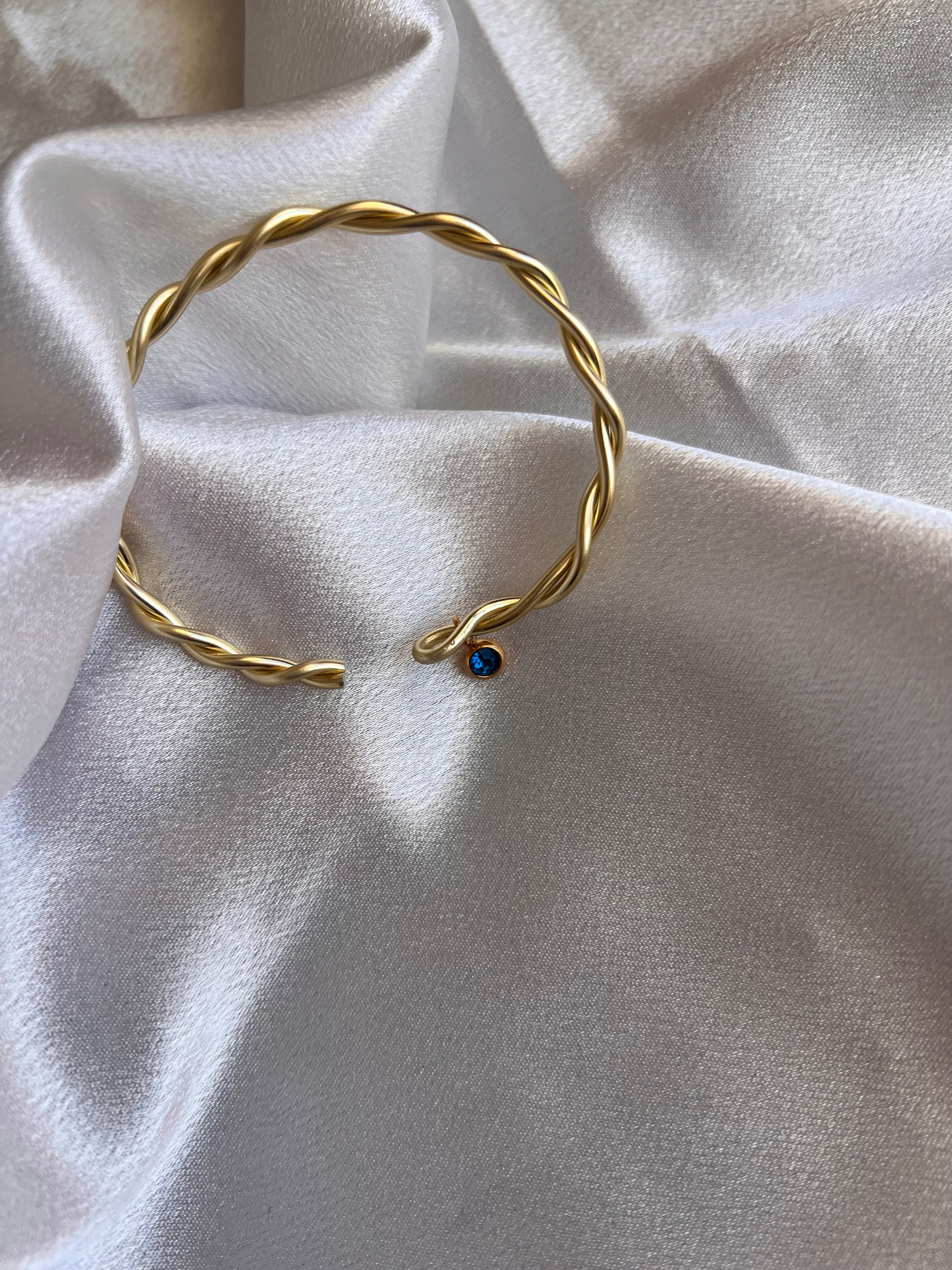 Χειροπέδα αλουμινίου με μπλε κρύσταλλο